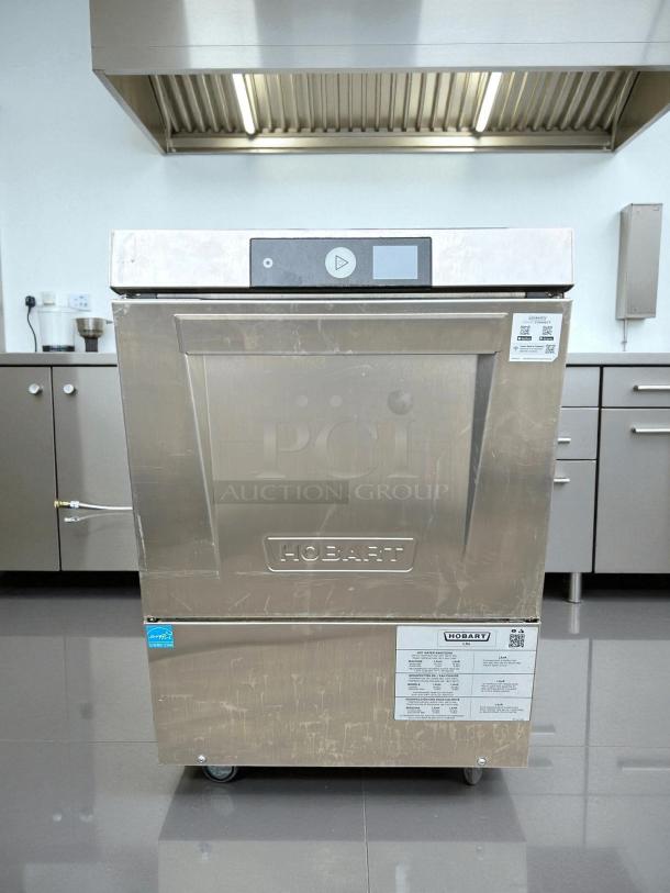 Hobart LXNH-2 high-temp undercounter dishwasher, excellent condition, 48 racks/hr, built-in booster, 120/208-240v, tested.