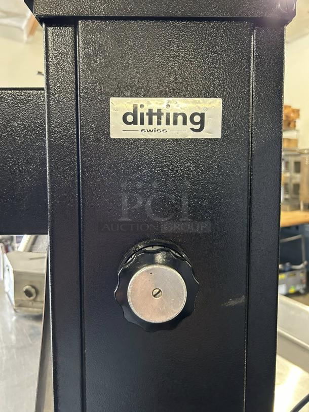 Ditting KR1203 commercial coffee grinder in great condition, black finish, tested and working. Features adjustable grind settings.