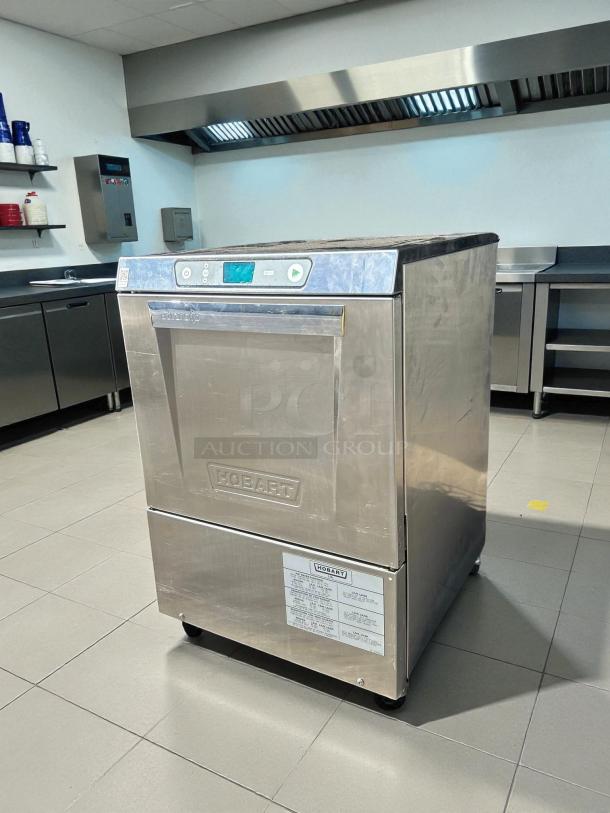 Hobart LXNH-1 undercounter dishwasher in excellent condition. Stainless steel, high-temp, tested, and working.