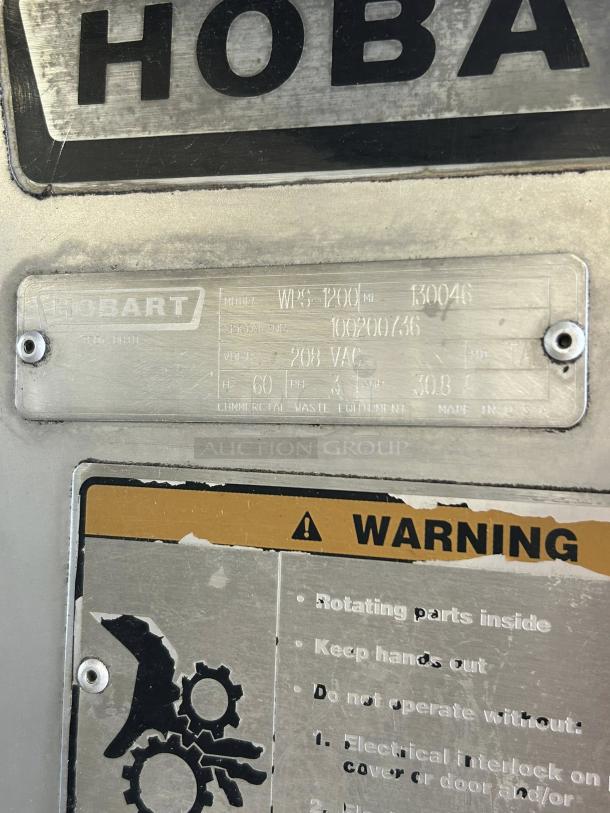 Hobart WPS1260+BUILDUP WastePro pulper, 1260 lb/day capacity, tested, with warning labels and manufacturer's plate.