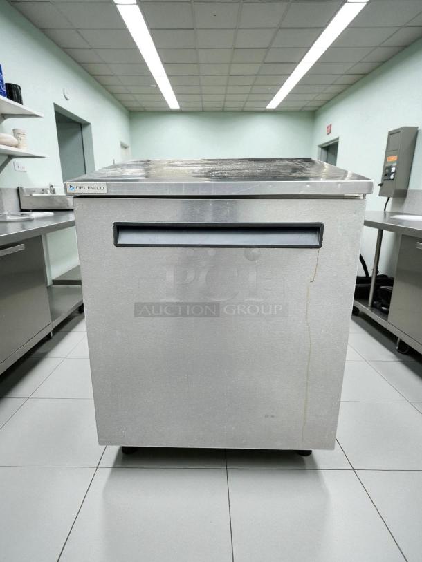 Delfield 4427NP 27"W undercounter refrigerator, stainless steel, one section, one door, tested, working condition.