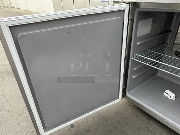 Delfield 4427NP 27"W undercounter refrigerator, 1 section, 1 door, 115v, tested and working, open door view showing interior.