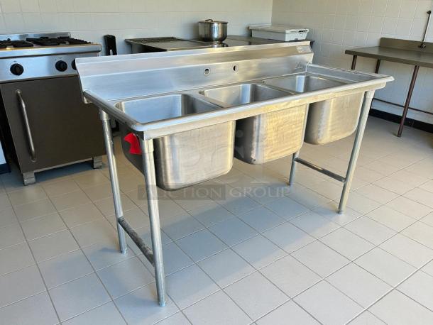 Advance Tabco T9-3-54-18L 77" 3 compartment sink, 16"x20" bowls, 12" deep, stainless steel, excellent condition.