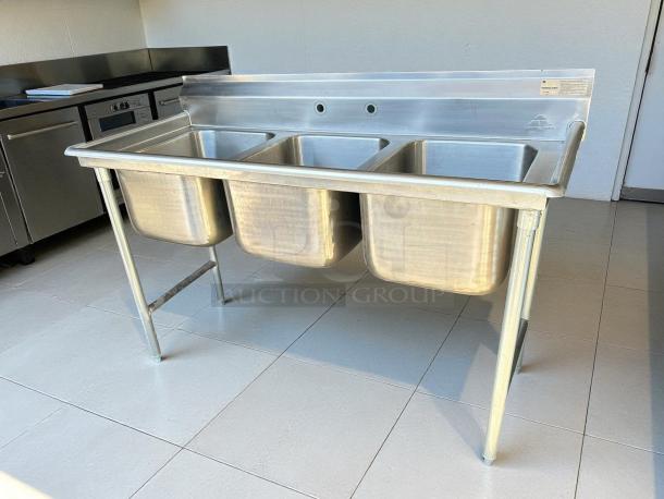 Advance Tabco T9-3-54-18L 77" 3-compartment sink, 16"x20" bowl, 12" deep, stainless steel, great condition, visible label.