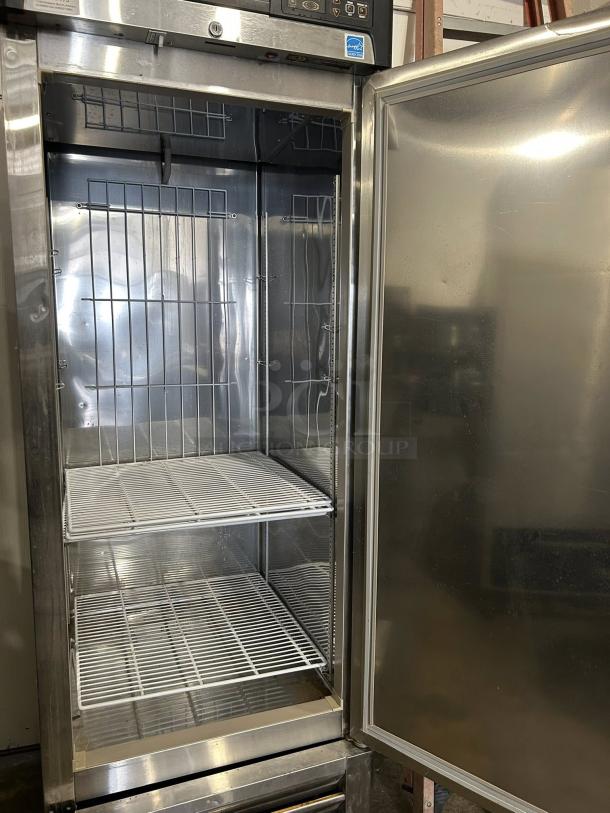 Nor-Lake NLF23-S 23cuft stainless steel reach-in freezer, single door, excellent condition, interior shelves visible.