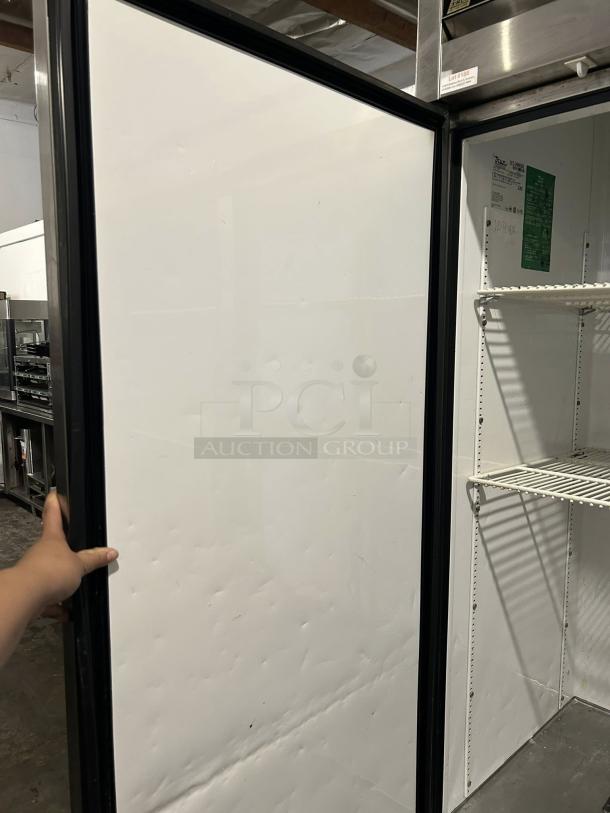 True T-49-HC Reach-In Refrigerator, 54 1/8", solid door, excellent condition, tested and working, interior shelves visible.