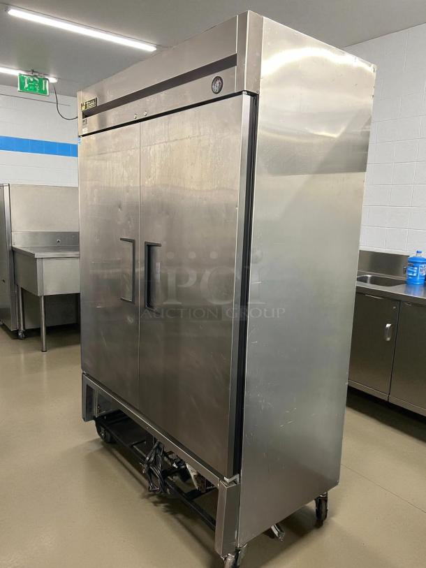 True T-49-HC solid door reach-in refrigerator, stainless steel, tested and working, on casters, visible brand logo.