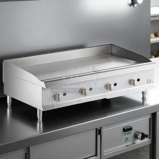 Cooking Performance Group GM-CPG-48-NL gas griddle, 48" countertop model, manual controls, stainless steel, like new condition.