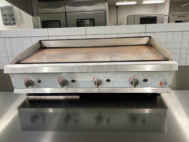 Cooking Performance Group GM-CPG-48-NL gas griddle, 48", manual controls, stainless steel, used condition, visible CPG logo.