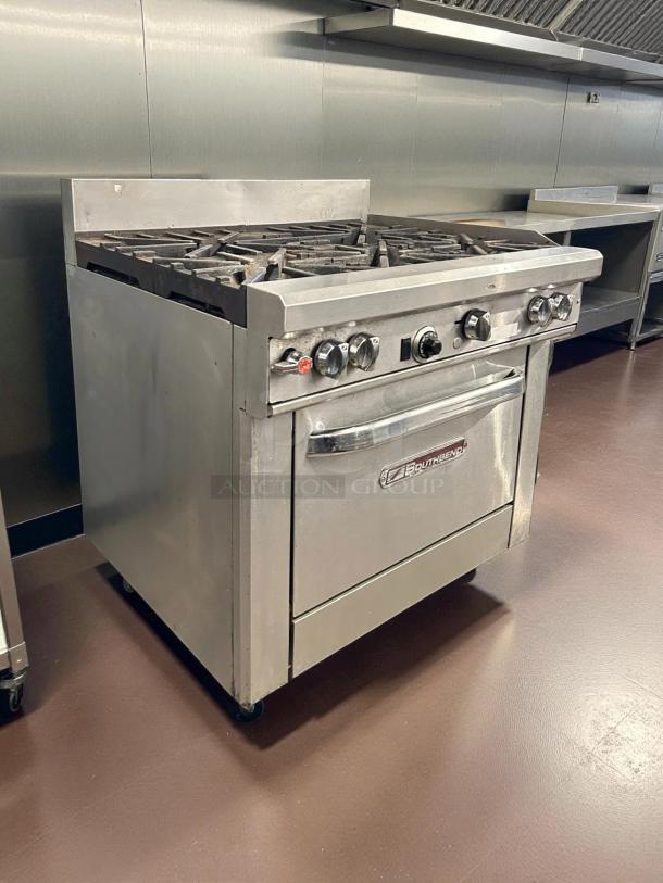 Southbend 4361D 36" 6-burner propane range with oven, stainless steel, tested, great condition, visible control knobs.