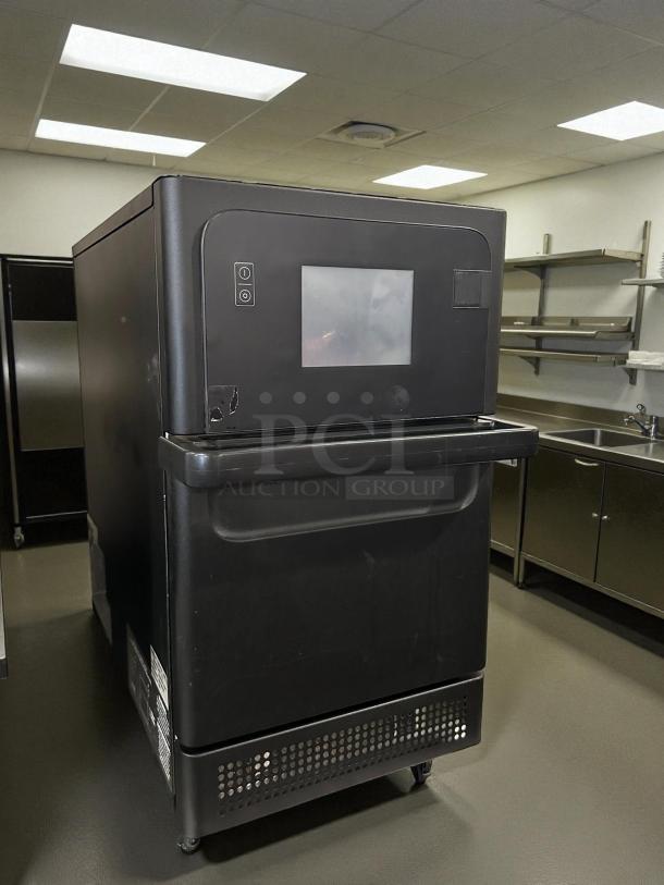 Merrychef eikon e1s high-speed cooking oven in excellent condition, tested and working, with digital display and control panel.