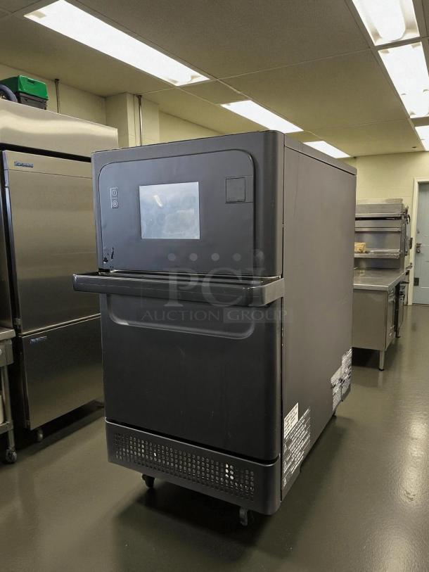 Merrychef eikon e1s countertop oven in excellent condition, featuring high-speed cooking technology, tested and working.