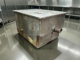PDI Universal LJ-20 grease interceptor, 20 lbs. capacity, 10 GPM, tested, working, visible rust, "OUT" labeled outlet.