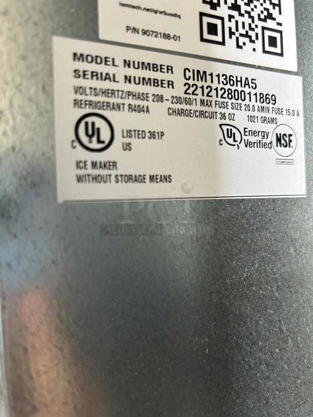 Ice-O-Matic CIM1136HA ice machine label showing model, serial number, voltage, and certifications.