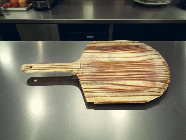 Winco WPP-1222 12" wooden pizza peel with rectangular blade, excellent condition, visible model marking on handle.