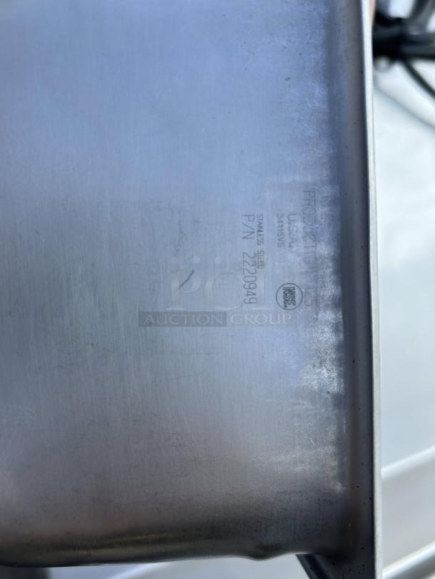 Stainless steel hotel pan, 1/9 size, 4" deep, in great condition. Markings: "Stainless Steel P/N 222094".