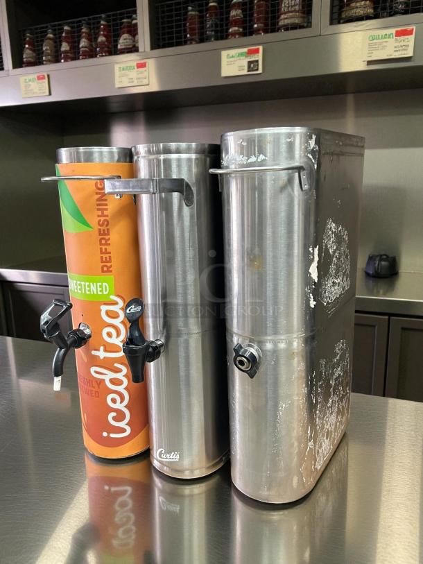 Curtis TCN 3.5-gallon stainless steel narrow iced tea dispenser, tested and working, visible wear and Curtis branding.