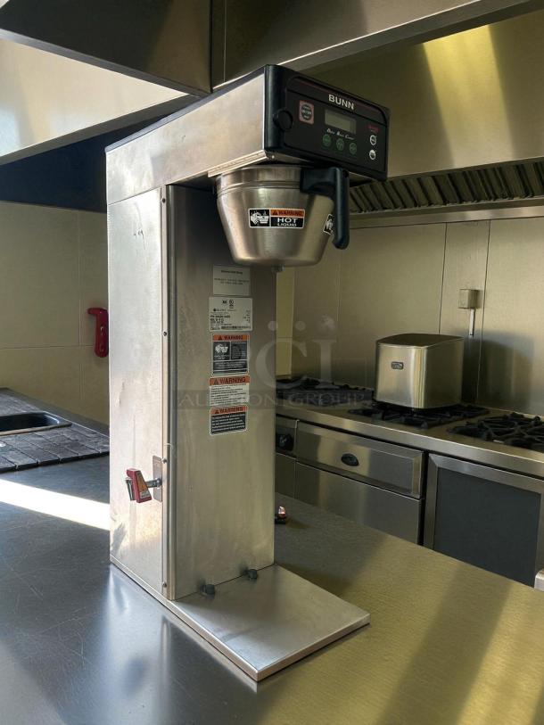 Bunn 53100.0001 BrewWISE ICB-DV stainless steel dual voltage tall coffee brewer, tested and working, with visible operation labels.