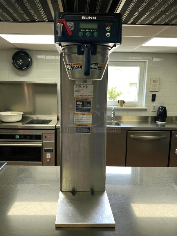 Bunn 53100.0001 ICB-DV BrewWISE stainless steel dual voltage coffee brewer, tested and working. Warning labels visible.