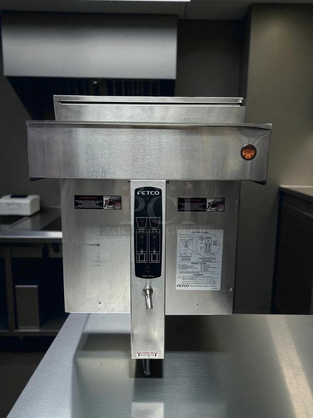 Fetco CBS-2032e coffee brewer, excellent condition, stainless steel, 1-gallon twin model, tested and working.