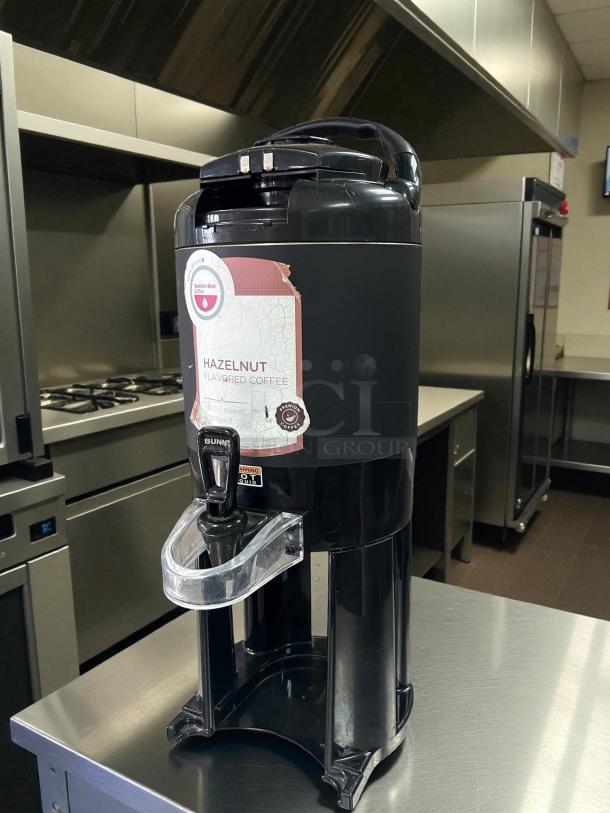 BUNN Dual BrewWISE ThermoFresh DBC Brewer, great condition, tested, working, funnel locks, TF SERVER model, featuring hazelnut coffee label.