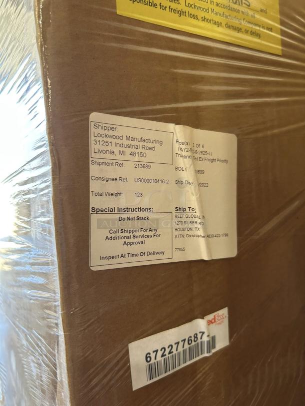 Brand new Lockwood CA72-RR12-6 full-height cabinet in unopened crate. Shipping labels indicate Livonia origin.