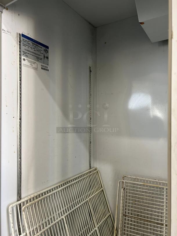 Beverage-Air CRG74-1 3-Door Commercial Refrigerator interior, white shelves, label with model details, tested and working.