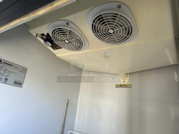Everest EMGR24 single swing glass door refrigerator interior, tested and working, featuring dual fans, caution label, and manufacturer tag.