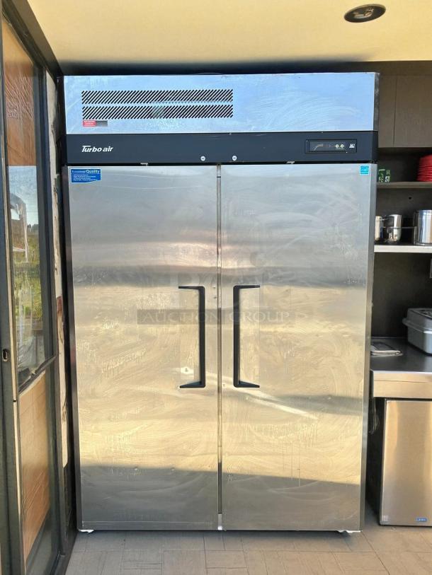 Turbo Air M3F47-2 double door reach-in freezer in outstanding condition, featuring a self-cleaning condenser, 115V, tested working.