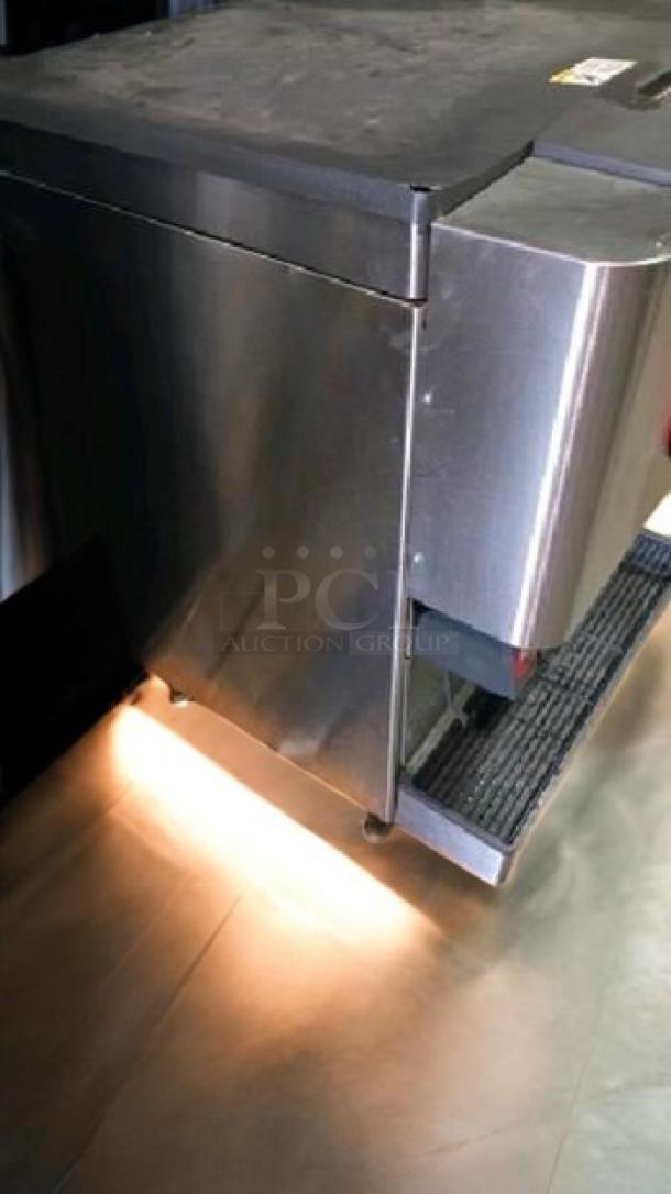 Lancer 41930R 8-flavor Coca-Cola soda fountain dispenser in excellent condition, tested and working, stainless steel finish.