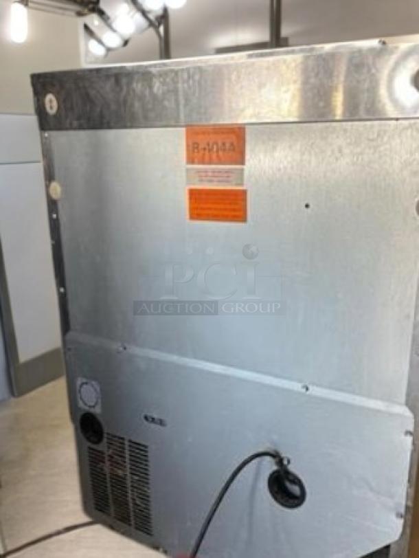 Delfield UC4427N-DHL undercounter refrigerator, 27" stainless steel, excellent condition, 115V. Tag shows model and refrigerant info.