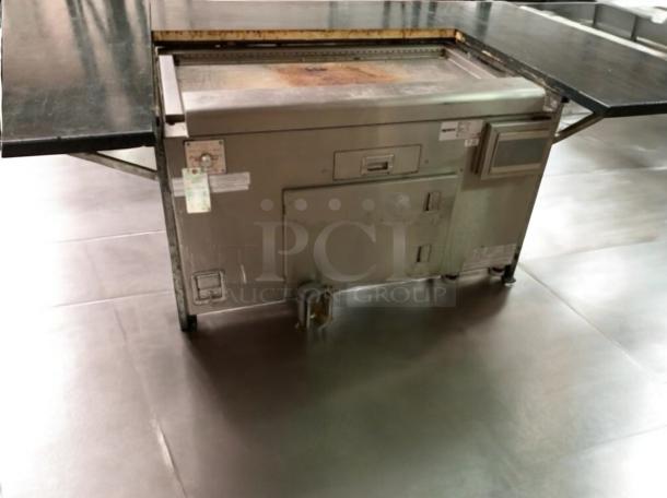 Space UM1EGA electric teppanyaki grill, 208V/3 Phase, stainless steel, tested and working, with visible control labels.