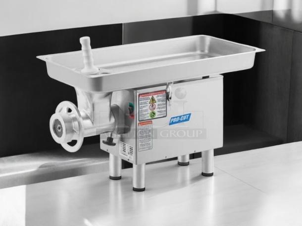 Pro-Cut KG-22W 1 HP meat grinder, superb condition, 115V, tested and working. Features stainless steel body and visible safety labels.