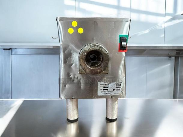 Pro-Cut KG-22W meat grinder, 1 HP, stainless steel, tested working, visible control switch, and manufacturer's label.