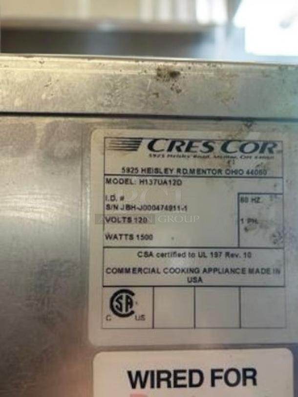 Cres Cor H137UA12D full-height mobile heated holding cabinet, 12-pan capacity, 120V, label shows model and certification details.