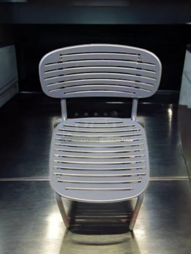 Lot of 7 blue metal patio chairs, modern slatted design, very good condition, Commercial Outdoor Furniture, durable steel.