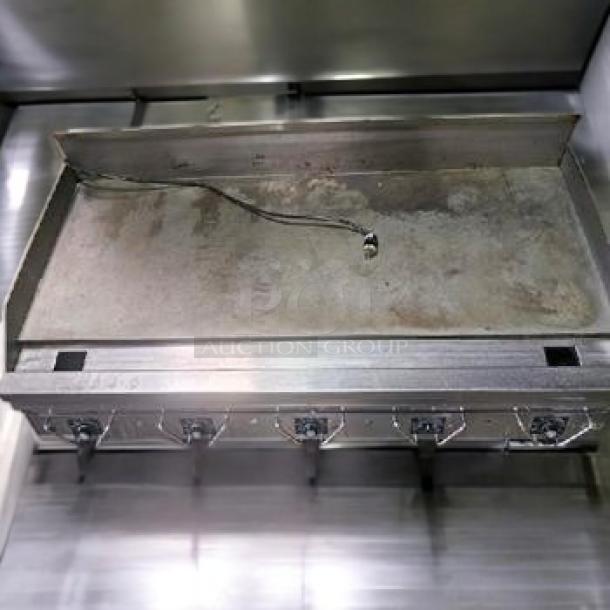 Garland CG-60F 60" gas griddle, very good condition, 1" steel plate, thermostatic controls, natural gas, fully tested.