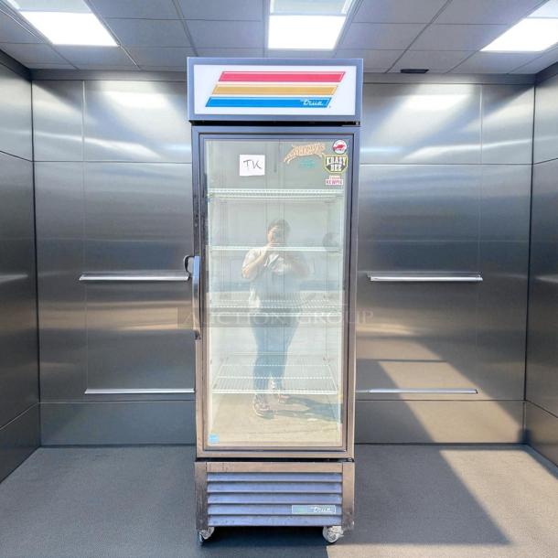 True GDM-23-HC-TSL01 single glass door merchandiser refrigerator, superb condition, fully tested, 115V, with stickers on the door.