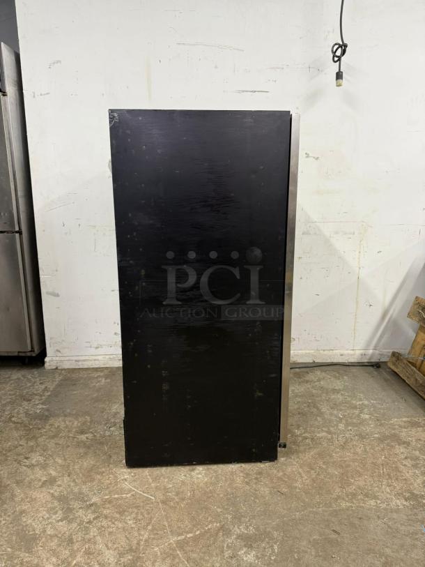 Summit Appliance SWCP2116 wine cellar, black exterior, side view, dual zone, for built-in or freestanding use, visible wear.