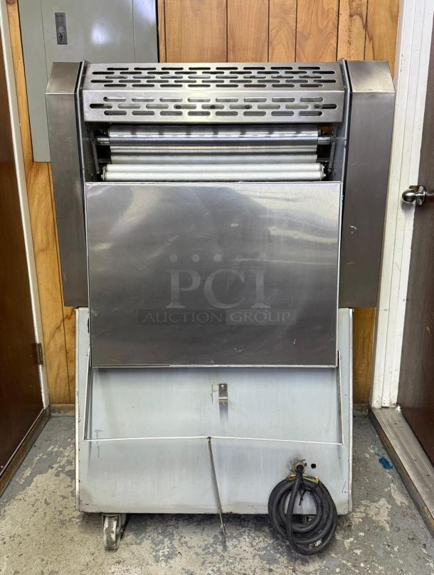 CIM International 4000S Dough Sheeter, stainless steel, used condition, visible wear, cables attached at base.