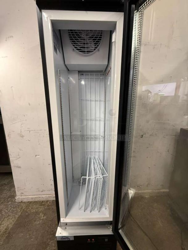 Yukon USF-175BLK commercial single glass door freezer, model USF-175 BLK, open door view, white interior, shelves inside.