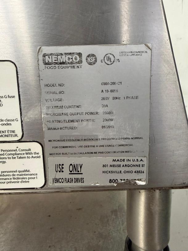 Nemco 6900-208-GF Commercial Panini Press, aluminum grooved/smooth plates, 208v/1ph, model 6900, label shows specs.