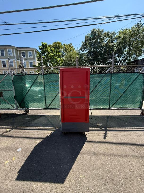 METRO C539-HDS-U C5 Heated Holding Cabinet, red, solid Dutch doors, outdoor setting, excellent condition.