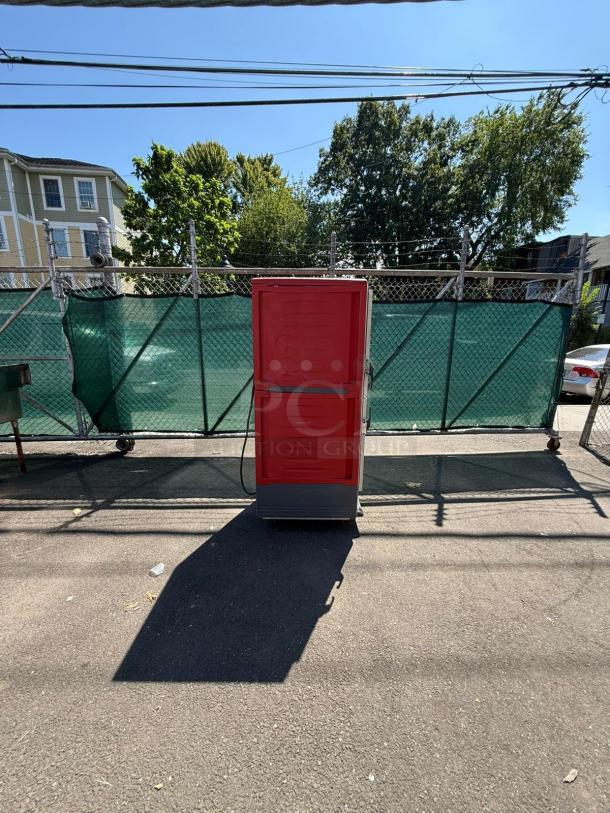 Red Metro C539-HDS-U heated holding cabinet with solid Dutch doors. Used condition, outdoor setting.