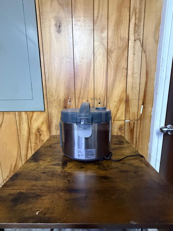 Instant Zest Plus 20-Cup Rice Cooker, stainless steel, by INSTANT POT, model ZEST 20, good condition with visible label.