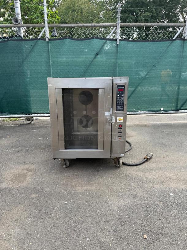 OLIVER 690-NC2 stainless steel commercial electric bread oven, features control panel, on wheels, used condition.