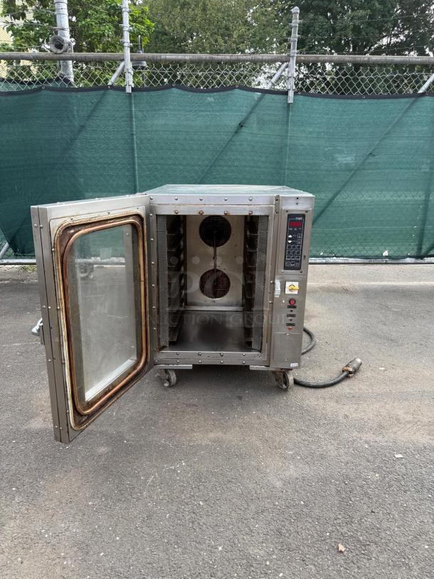 OLIVER 690-NC2 stainless steel electric bread oven, open door, racks visible, control panel intact, used condition.