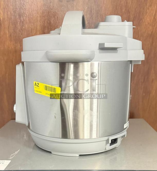Instant Pot Pro Multi-Use Pressure Cooker, White, Model LPZK0450032, stainless steel, with a visible label showing the model.