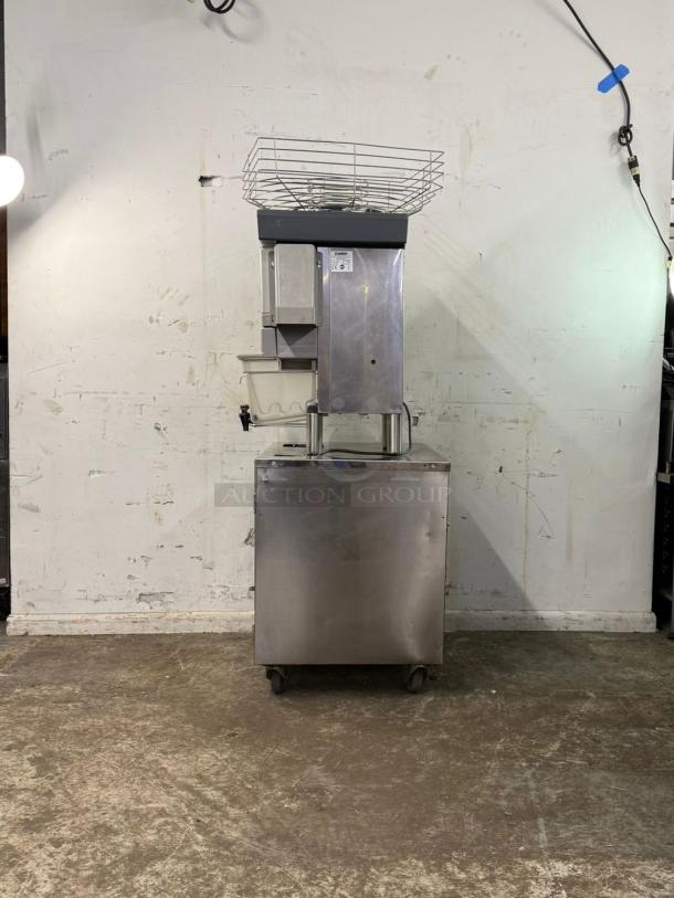 Zummo Z40-N-LM Citrus Juicer, automatic feed, 290W, stainless steel, holds up to 25 fruits/minute, on wheels, industrial use.