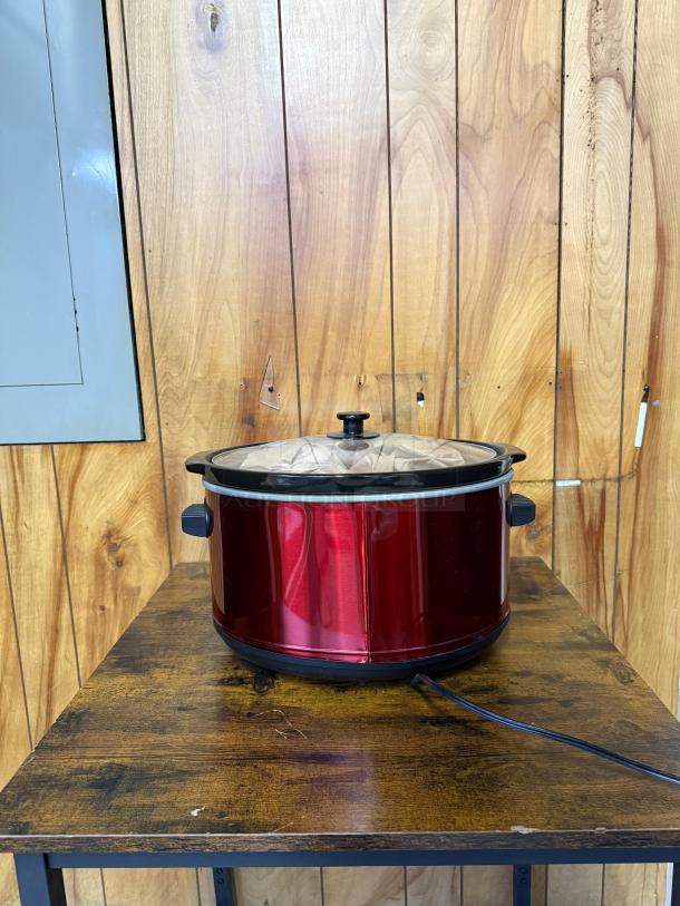 Elite Gourmet 8.5-qt stainless steel slow cooker, red finish, glass lid, good condition, power cord attached.